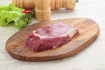 Raw rib-eye beef steak black angus