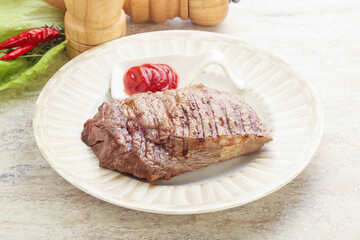 Grilled rib-eye steak beef meat