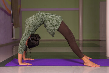 Female stretches yoga poses