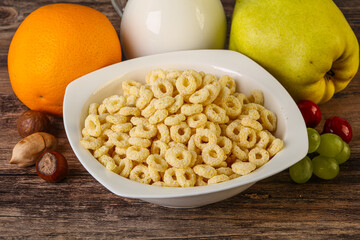 Breakfast with corn rings and milk