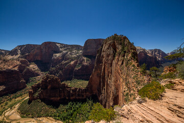 Angel's landing is a rock formation rising nearly 1500 feet from the valley in Zion National Park,...