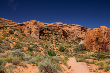 Landscape Arch stretches across the skyline at Arches National Park in Utah