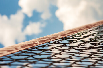 Tennis net against the blue sky