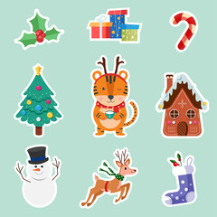 Christmas stickers tiger, socks, candy, gifts, gingerbread house and deer