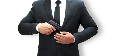 A man in a black bodyguard suit is holding a pistol at chest level ready to keep the VIPs safe. White background isolate.