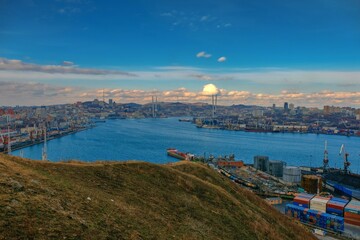 view of the city at sunset from hill