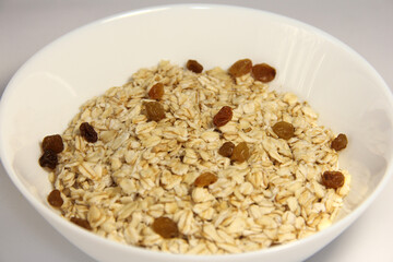 Oatmeal with raisins. Close up.