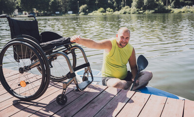 Person with a physical disability ride on sup board