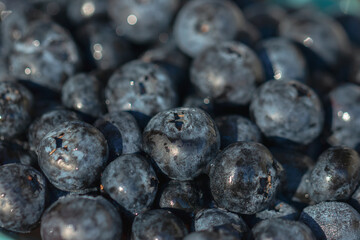 Ripe blueberries on a plate