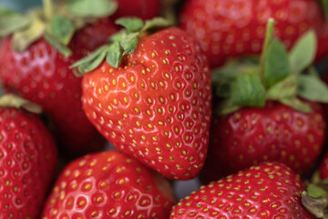 Ripe red strawberries on a plate