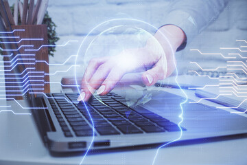 Multi exposure of woman hands working on computer and brain hologram drawing. Ai concept.
