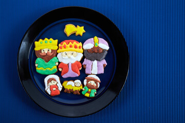 Happy Epiiphany day. Homemade cookies in the shape of the three wise men and Holy family.