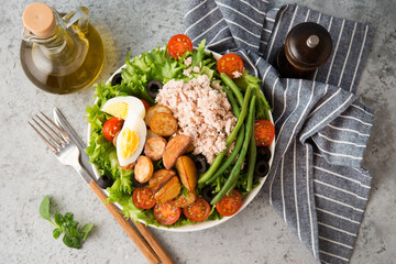 Nicoise salad with tuna, beans, vegetables and potatoes