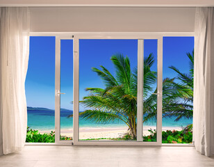 large glass door overlooking the beach