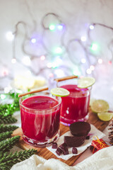 Beetroot and pineapple smoothie in glasess for dinner, party, celebrate or Christmas new year healthy drink