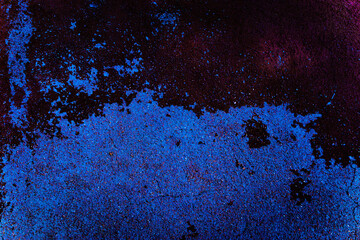 Neon wall. Dark blue night light background. Abstract bar brick neon texture. Lighting effect pink and blue on empty brick wall.