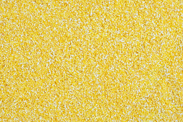 Abstract texture from corn grits. Corn products, gluten-free food.
