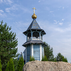 Fototapeta na wymiar blue wooden bell tower