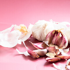 Garlic glove and bulb on mauve lbackround