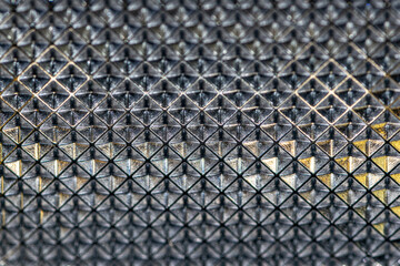 abstract background embossed glass. Shaped headlight glass texture.