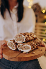 a girl holds Turkish Turkish delight sweets in her hands