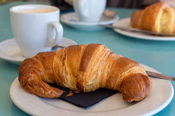 Breakfast with crisp, freshly baked croissants.