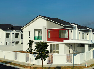 Fototapeta na wymiar SEREMBAN, MALAYSIA -APRIL 16, 2020: Selected focused on new double story terrace house under construction in Malaysia. Designed by an architect with a modern and contemporary style. 