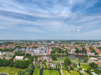 Sunny summer aerial cityscape of Gouda, cheese capital town in Netherlands 