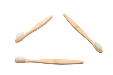 Bamboo toothbrush isolated on a white background.