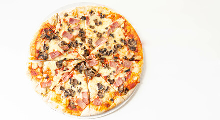 Freshly baked large pizza with ham, mushrooms and mozzarella on a traditional dough