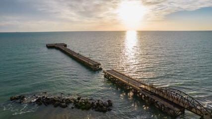 Obraz premium Aerial View at Sunset of the Allies Pier of Landing in Gela City, Caltanissetta, Sicily, Italy, Europe