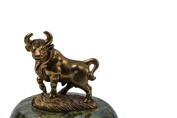 Beautiful view of bronze figure of Taurus cattle sign isolated on white background.
