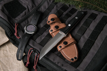 tactical watches and backpack with sharp knife