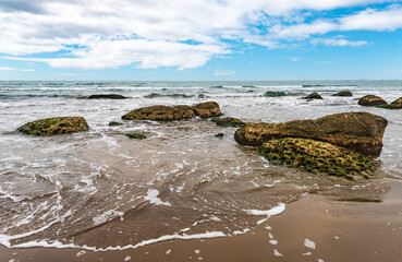 Sea coast with big boulders