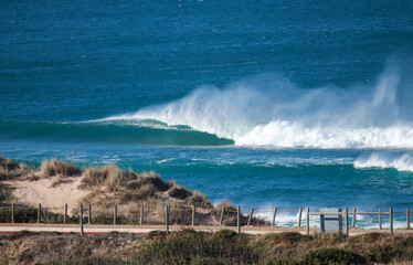 Perfect wave breaking in a beach. Surf spot