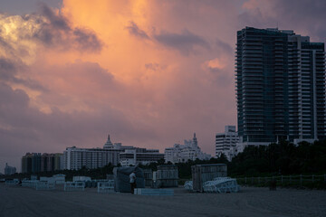 buildings on Miami Beach at sunrise with dramatic clouds