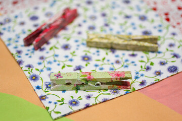 Wooden clothespins made by decoupage technique. Creativity, DIY background