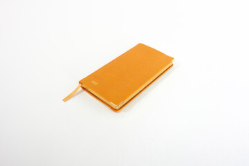 Notebook, yellow notebook isolated on white background.