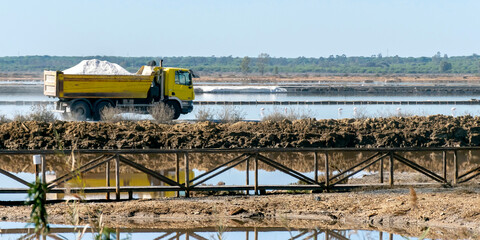 A loaded truck transfers the collected sea salt to its destination