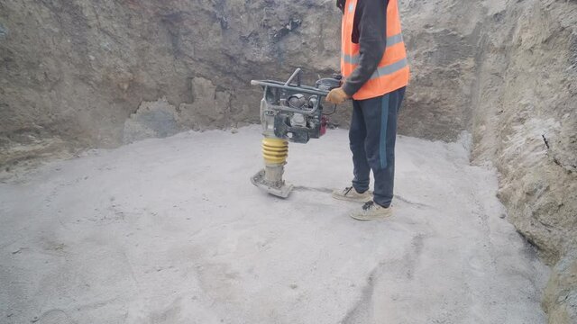 Excavation tractor works, compaction of the soil