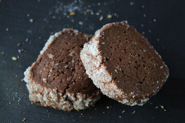 chocolate shortbread cookies on a dark background