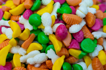 Children's marmalade candies in the shape of a banana, pineapple