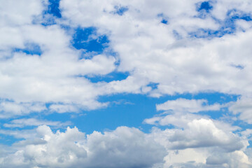 Puffy white clouds. Cloudy sky abstract background