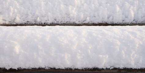 Abstract background of white textured snow.