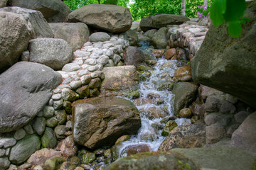 Landscape of waterfall in Korean garden in Garten der Welt Marzahn Berlin Germany