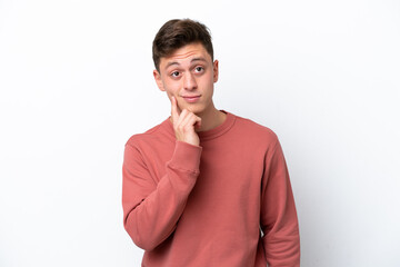 Young handsome Brazilian man isolated on white background and thinking