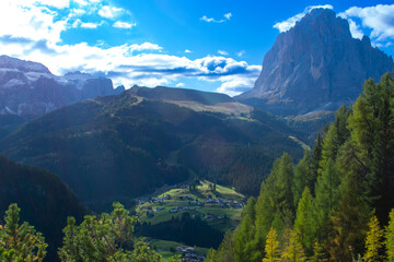 Obraz premium Hiking Dolomites in European Alps. Shot in summer with green grass and no snow. Gardena Pass, Italy