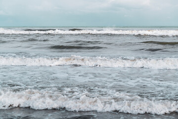 Fototapeta na wymiar Sea waves from the beach