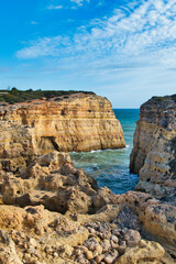 Typical coastal landscape of the rocky limestone coast of the Algarve, Portugal. Between Benagil and Alfanzina.