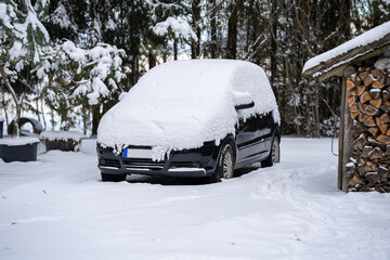 A car under a snow drift.